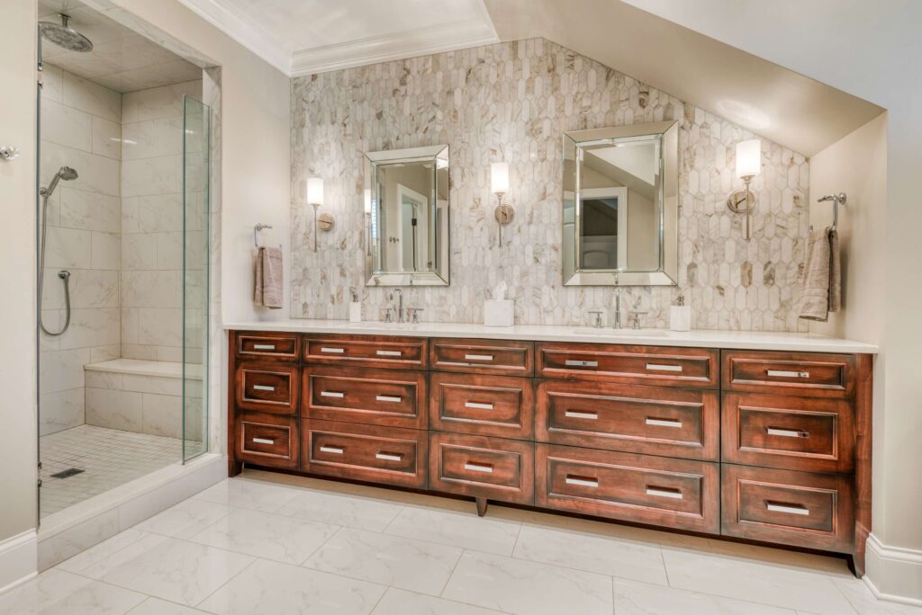 Wooden Cabinets, Basins and Glass Door in Bathroom