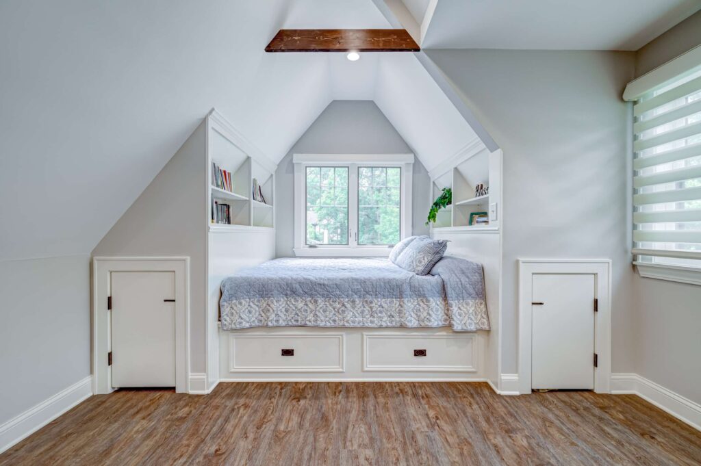 A bedroom with two little cabinet doors