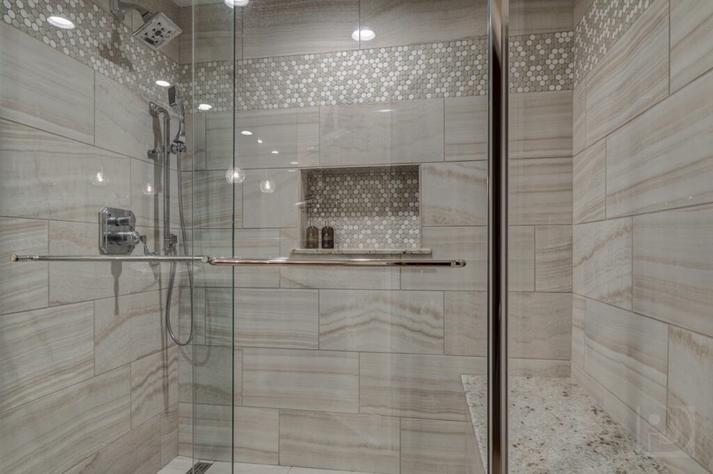 A shower area with glass cover
